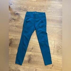 All in motion teal leggings. Size 10-12